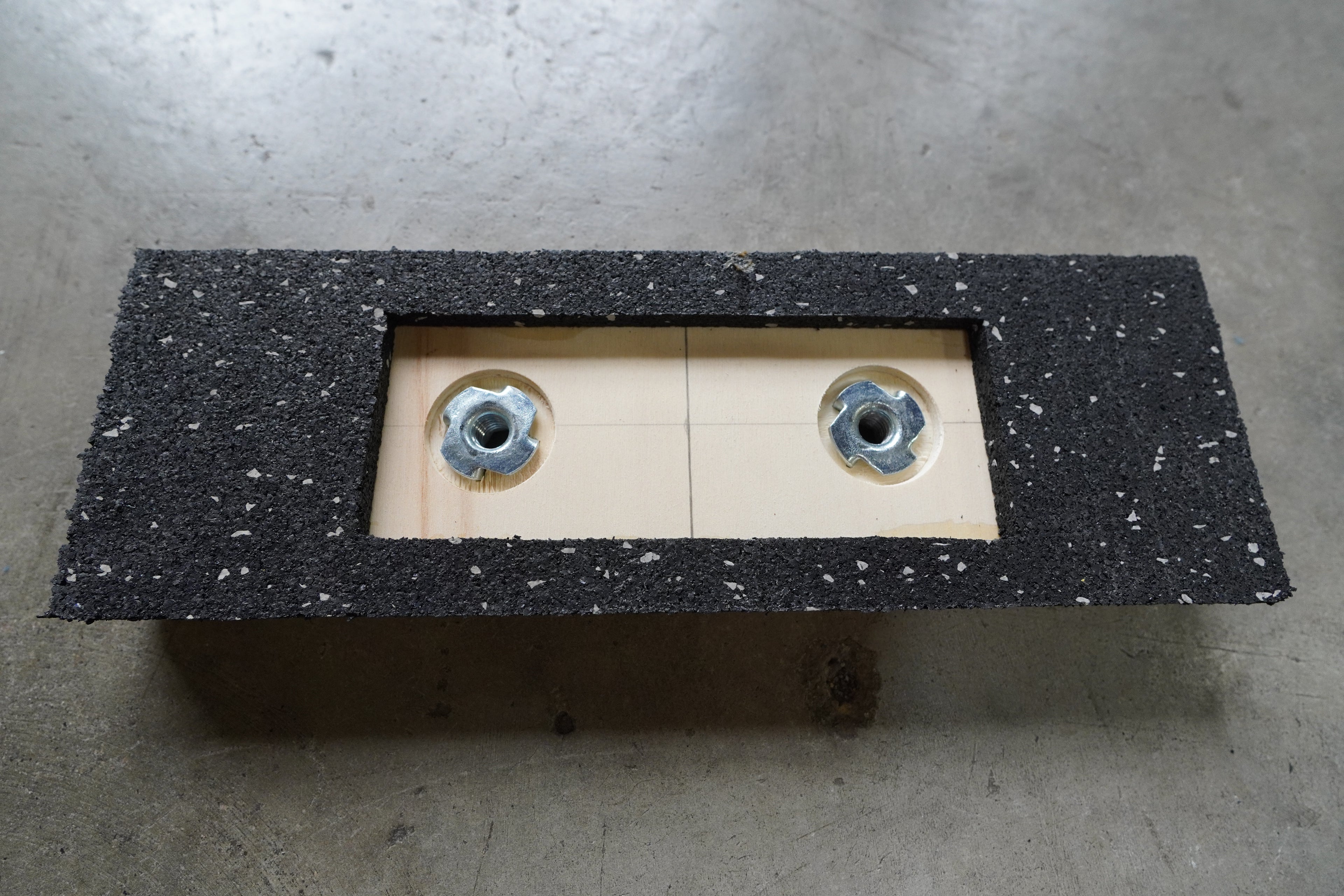 underside of a parkour balance trainer with tee nuts exposed